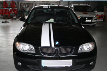 Front wheel, bumper and light detail of a modern sporty luxury car